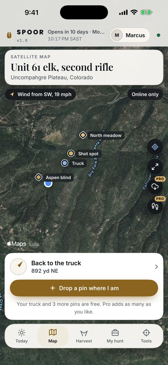 Spoor Hunt's satellite map of an elk unit in Colorado, with four pins (the truck, a meadow stand, a blind and the shot spot) and the way back to the truck, 892 yards north east.